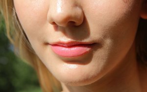 18 year old girl Agnes uncovers her perky tits as she gets completely naked